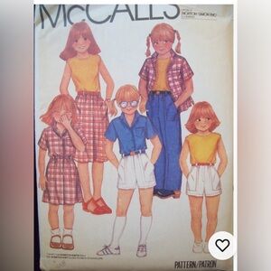 Vintage McCalls Pattern 7015 
Girls Shirt, Pants, Shorts, Skirt 
Size 7 UC NOS
